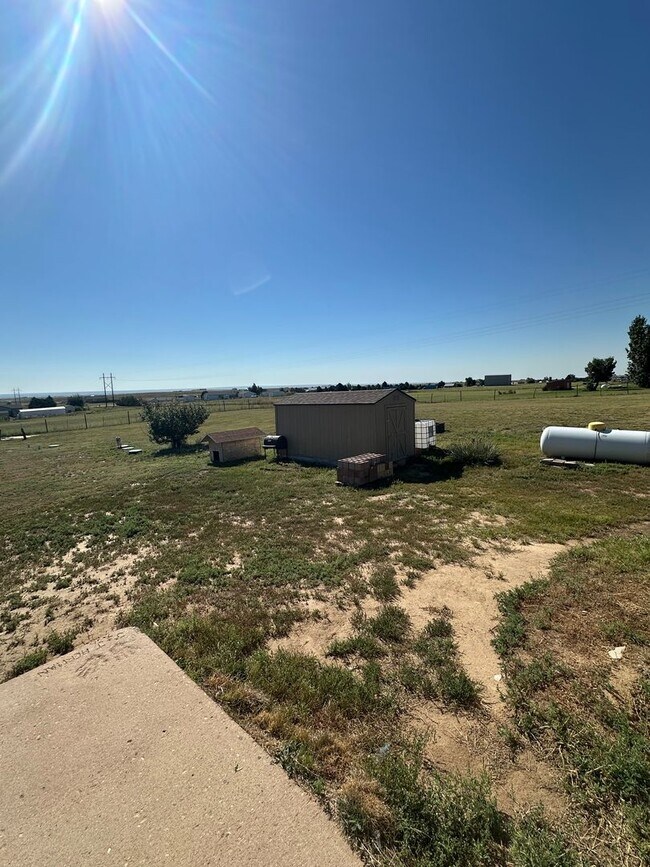 Building Photo - MODERN UPGRADES AND RURAL LIVING IN PEYTON