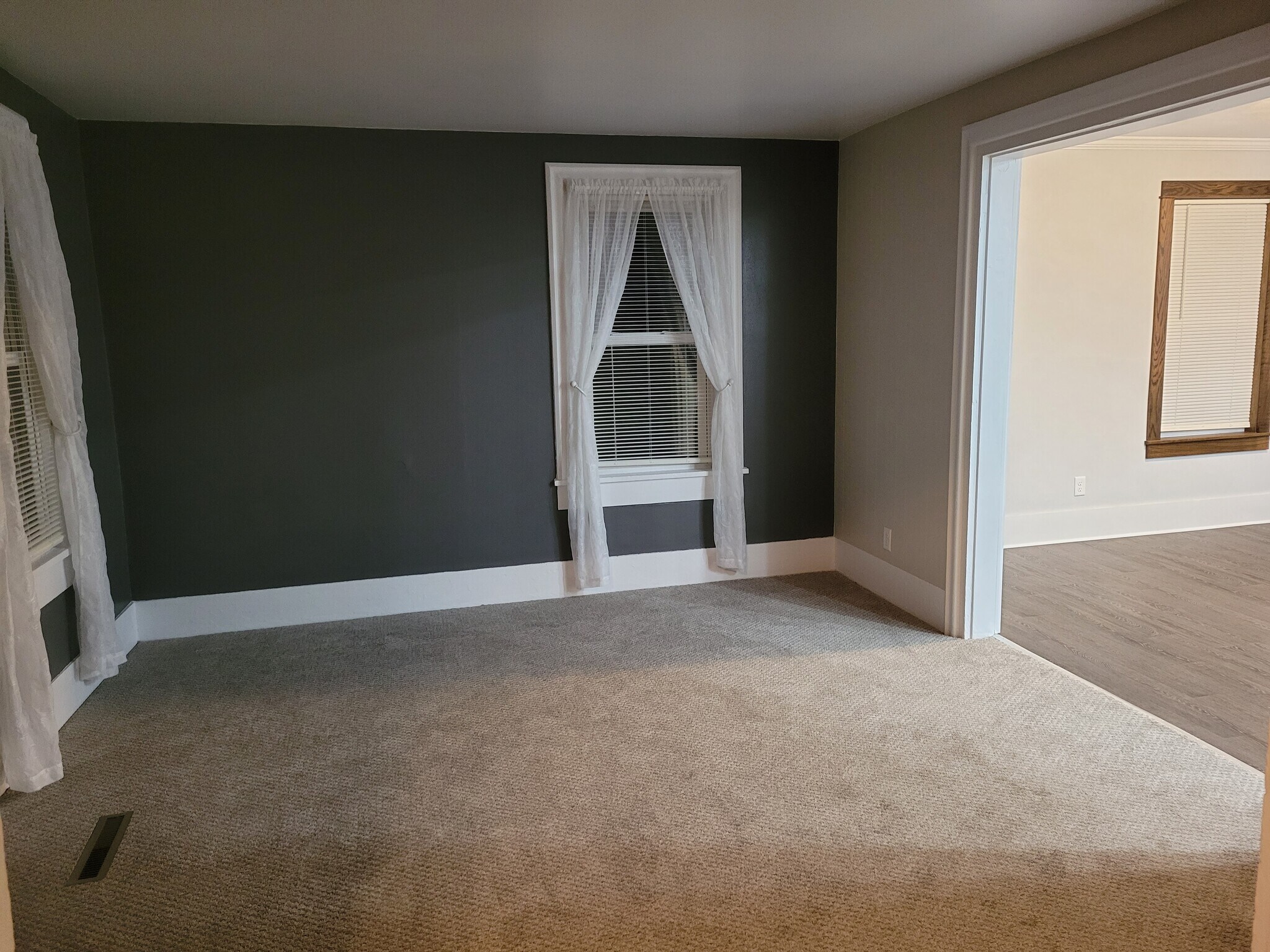 Freshly painted living room with newer carpet - 1803 8th St