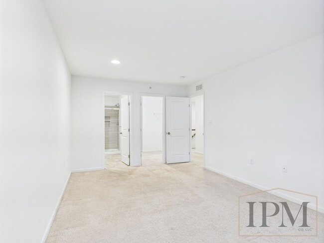 Building Photo - 2-bedroom 2.5 bath Luxury Townhome located...