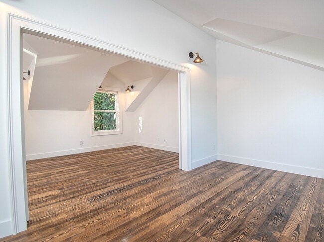 Building Photo - Expansive Loft-Style Carriage House in Private Haller Lake Estate