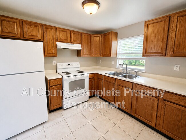 Building Photo - 10881 Key Coral Dr