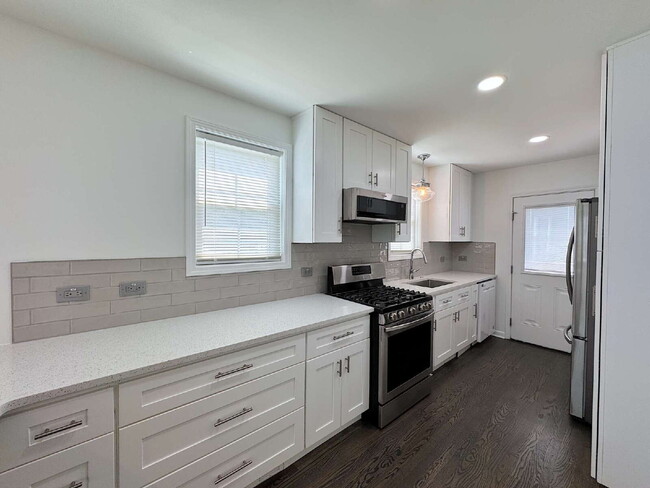 Building Photo - Stylish Updated Home Just Minutes from Dow...