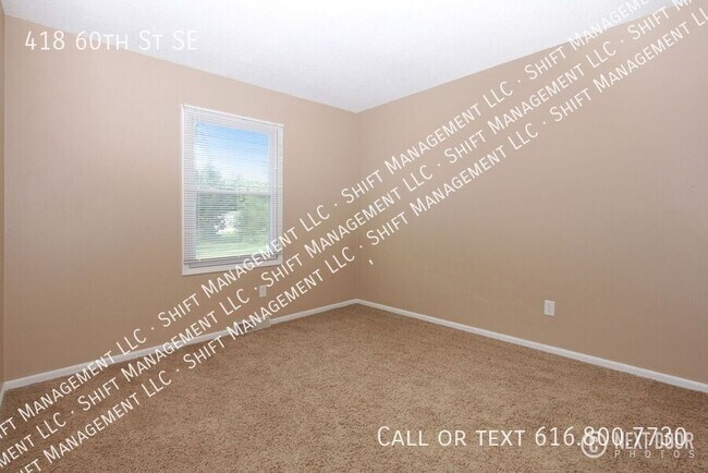 Building Photo - 418 60th St SE