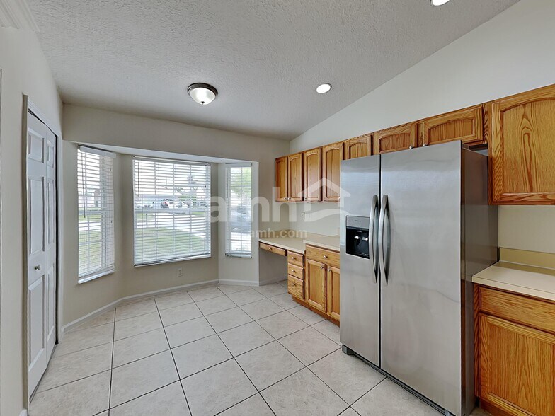 Building Photo - 1009 SW Alcantarra Blvd