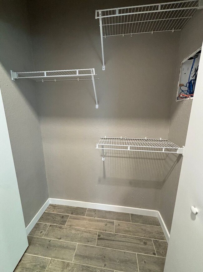 Building Photo - A1121 Woodbury Row Phase III