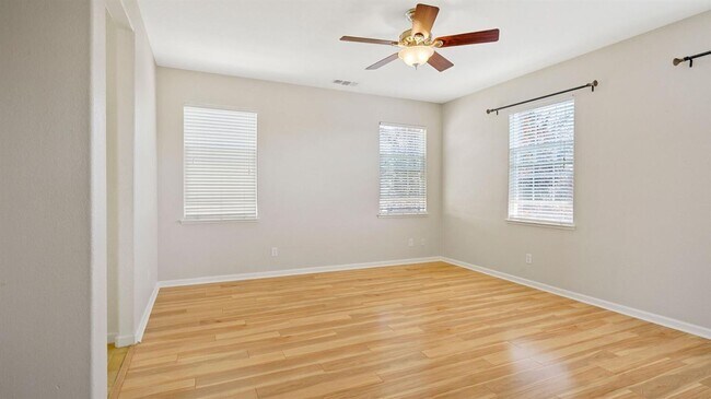 Building Photo - ADORABLE 4 BED/2.5 BATH TOWNHOME WITH CORNER LOT AND LARGE FENCED REAR YARD WITH PATIO