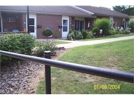 Building Photo - Evergreen Village Apartments