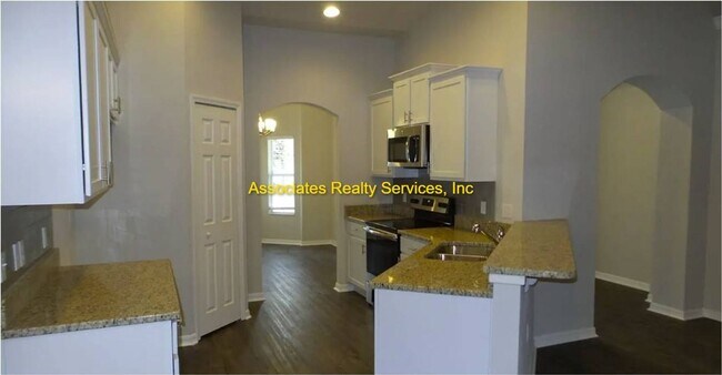 Building Photo - Spacious 4-Bedroom Home with Office in Portofino!  LOOK!