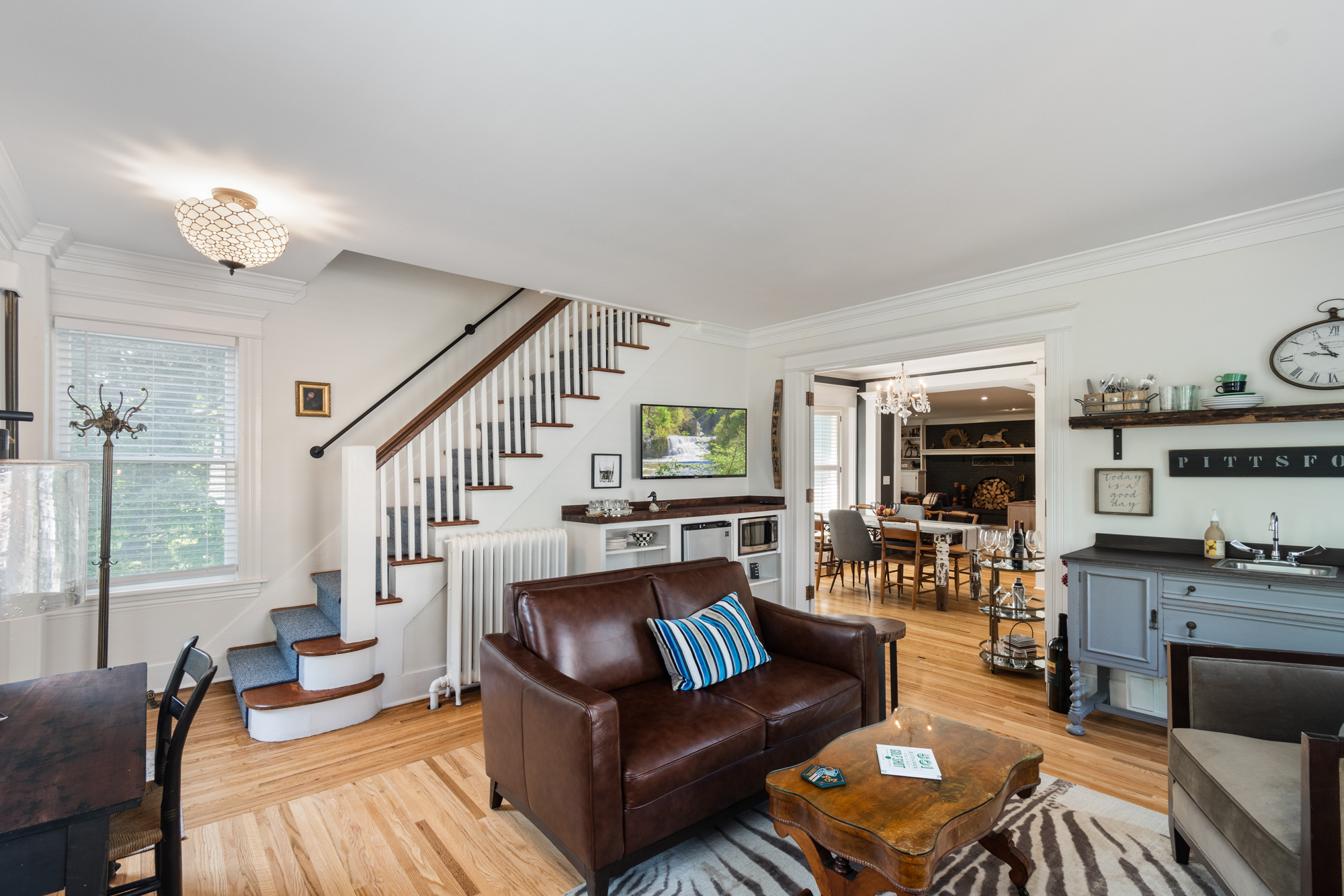 Open floor plan to living room, staircase with runner - 5 W Jefferson Rd