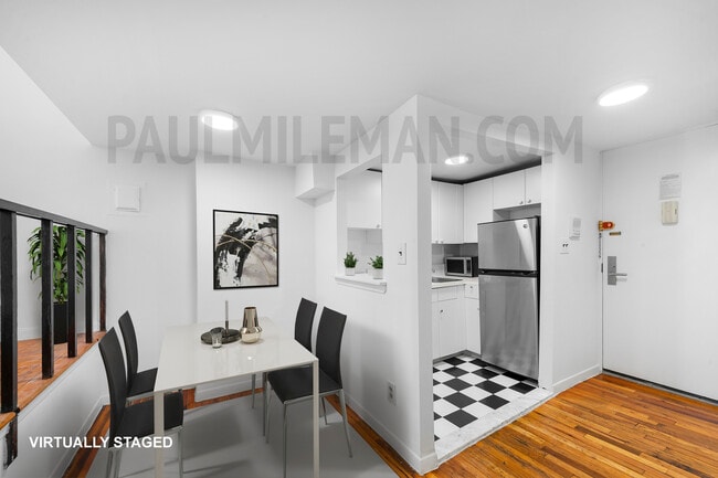 one-bed dining - 85 E 10th St