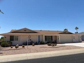 Building Photo - 9807 W Mockingbird Dr
