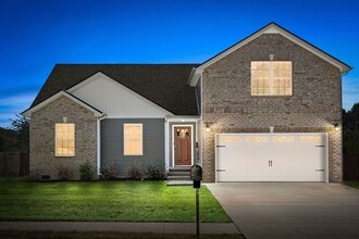 Building Photo - Pet Friendly Three Bedroom with Bonus!