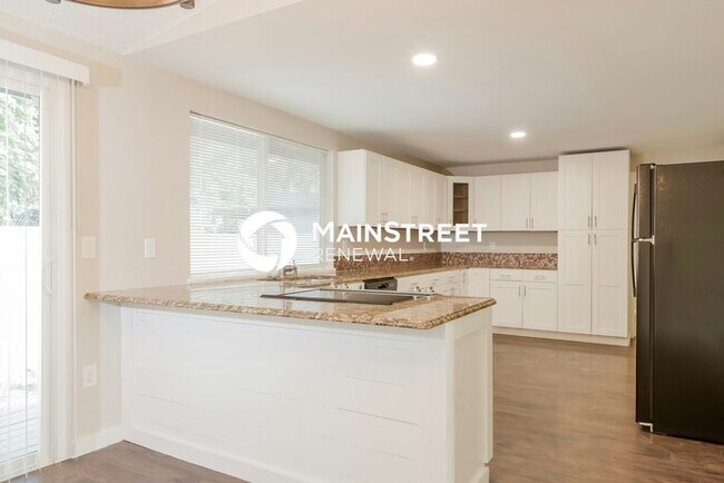 Building Photo - 4 Bedroom Pet-Friendly Home in PUYALLUP, WA with Main Street Renewal