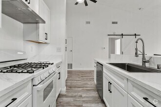 Building Photo - UPGRADED ONE BEDROOM OASIS IN GATED COMMUNITY