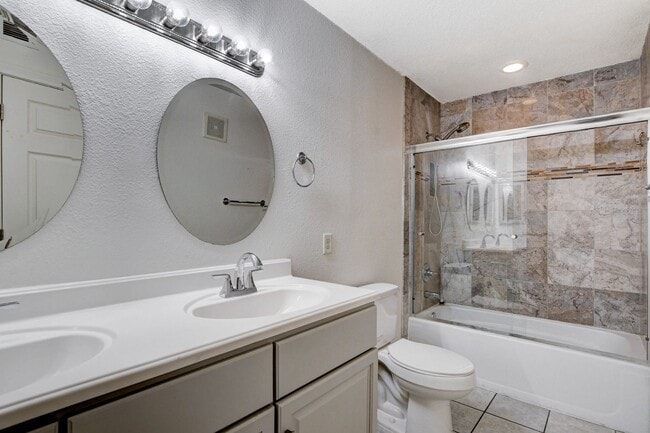 Building Photo - AMERICANA Property Mgmt - Gated 1st floor ...