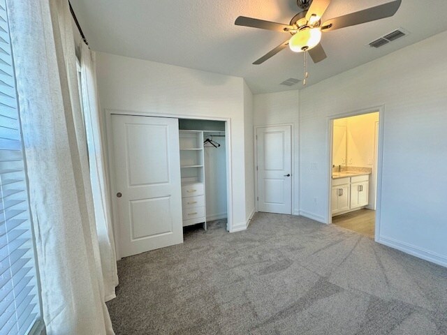 Secondary Bedroom w/closet organizer in each - 11687 74th Cir E