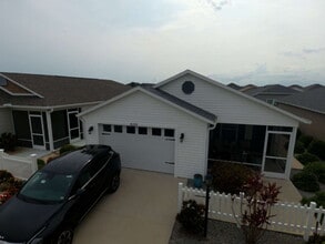 Building Photo - Furnished Rental with Golf Cart Included!