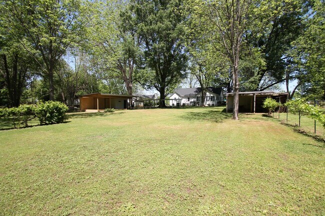 Building Photo - Exclusively Offered By Muse Realty Rentals, LLC