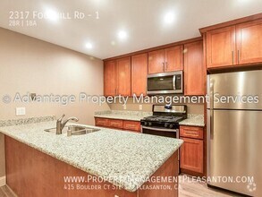 Building Photo - Updated 2 Bed, 1 Bath, 798 sq. ft. Condo l...