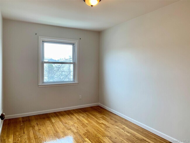 Building Photo - 15-47 209th St