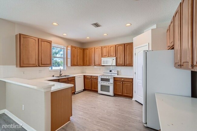 Building Photo - 4 br, 3.5 bath House - 4111 Balington Dr UNIT