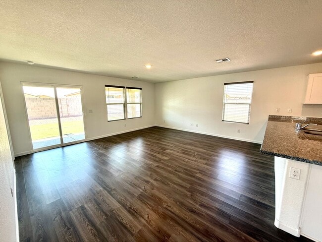 Building Photo - Spacious 4 Bedroom Home with Solar & Modern Upgrades- Available Now!