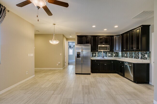 Building Photo - Beautiful Next-Gen Home with Private Entry Suite & Spacious Backyard