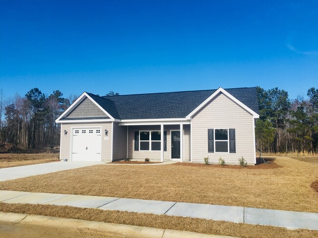 Building Photo - AVAILABLE 3 Bedroom/ 2 Bath with attached garage! Beautiful finishes throughout