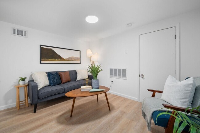 Building Photo - $1795 - Single Family Home with Private Two-Level Living Spaces, Driveway Parking & Modern Updates