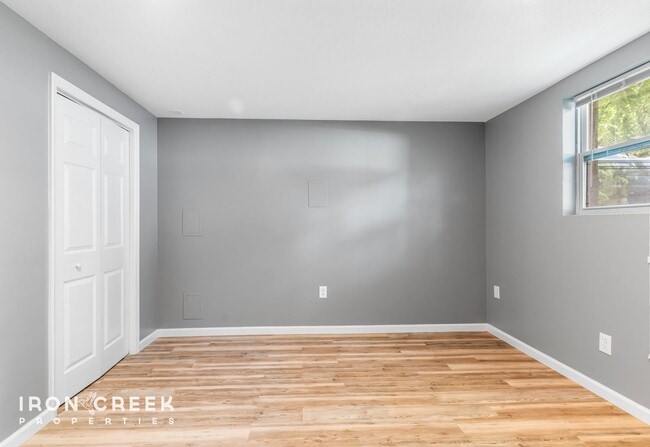 Building Photo - Beautifully Updated Three-Bedroom with Koi...