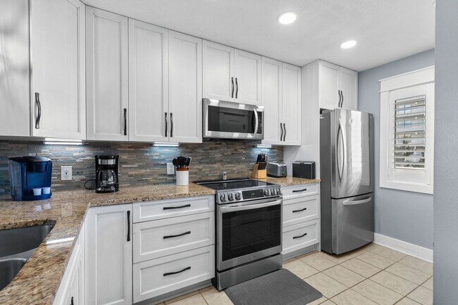 Building Photo - “Beachside Living – 2BR/2BA Condo with Oce...