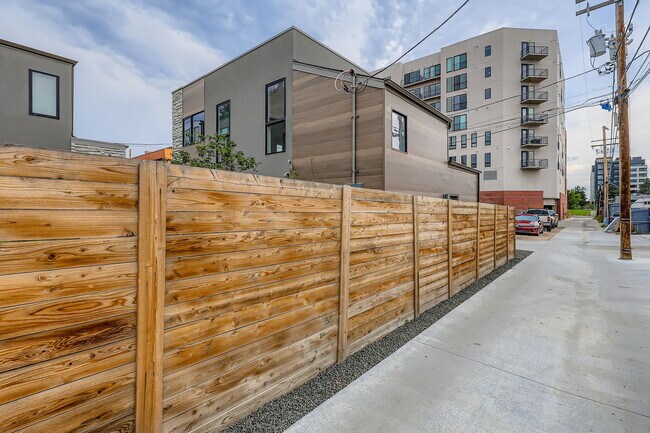 Building Photo - Swanky 1BR – New, Private Garage, Storage,...