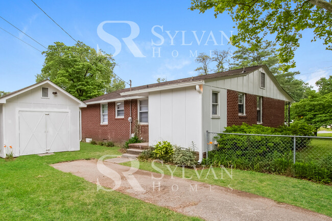 Building Photo - Welcome to this charming abode.