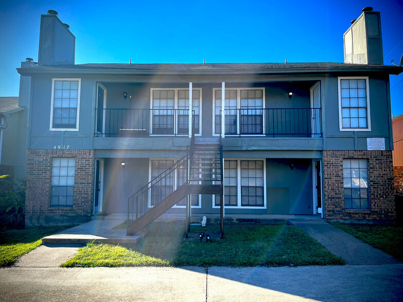 The front exterior of the building features a blend of brick and siding, with clean tones. - 4917 Jamesway Rd