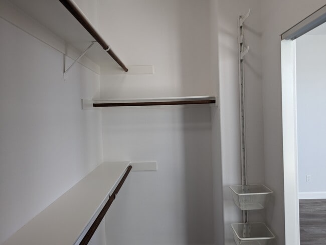 Walk-in closet in main bedroom - 305 W Duarte Rd