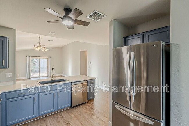Building Photo - 13930 W Country Gables Dr