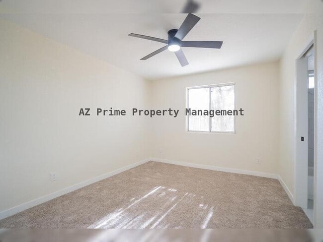 Building Photo - 3142 N 78th Dr