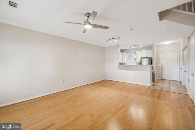 Building Photo - This townhouse style condo is located across the street from the Vienna Metro Station (Orange Line).