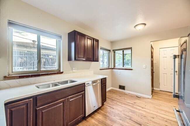 Building Photo - Spacious Home w/Large Backyard Only Blocks...