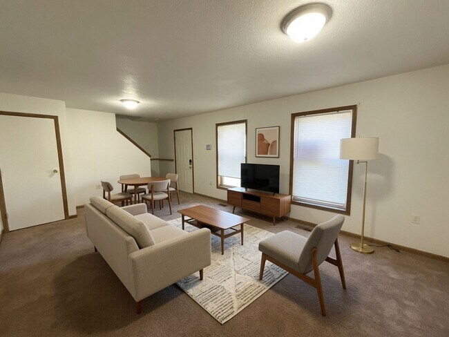 Building Photo - For Rent - 4 Bedroom, 2 Full Bath Home with Ground-Floor Bedroom, Attached Garage and Brand-New K...