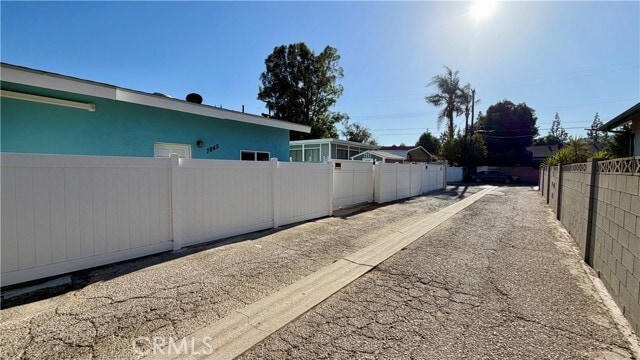 Building Photo - 7845 Woodlake Ave