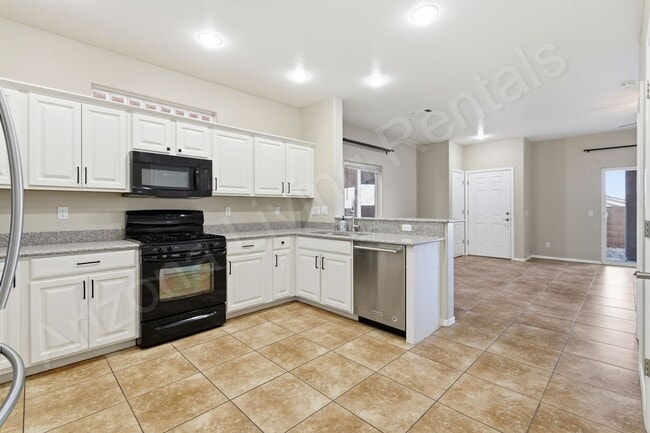 Building Photo - CENTRALLY LOCATED LA COSTA TOWNHOME