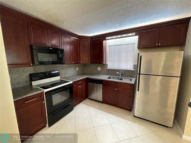 Building Photo - 12222 Royal Palm Blvd
