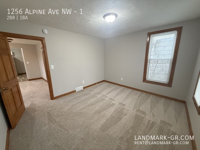 Building Photo - Spacious 2-Bed, 1-Bath – First Month $875 ...