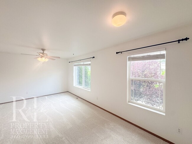 Building Photo - Spacious 4-Bedroom Home with Brand-New Carpet, Two Living Areas & Loft