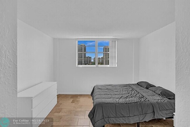 Building Photo - 19390 Collins Ave