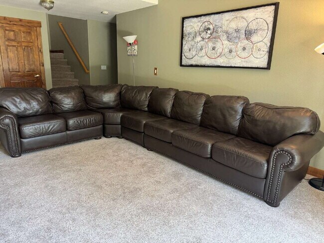 Building Photo - "Spacious 4-Bedroom Retreat with 3 Full Ba...