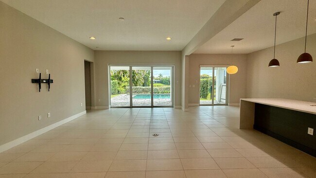 Building Photo - Rare Lakefront Pool Home in Exclusive Gated Sandhill Lake – Resort-Style Living Awaits