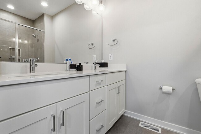 Building Photo - Live Elevated in Downtown Raleigh – Stunning Townhome with Rooftop Oasis!
