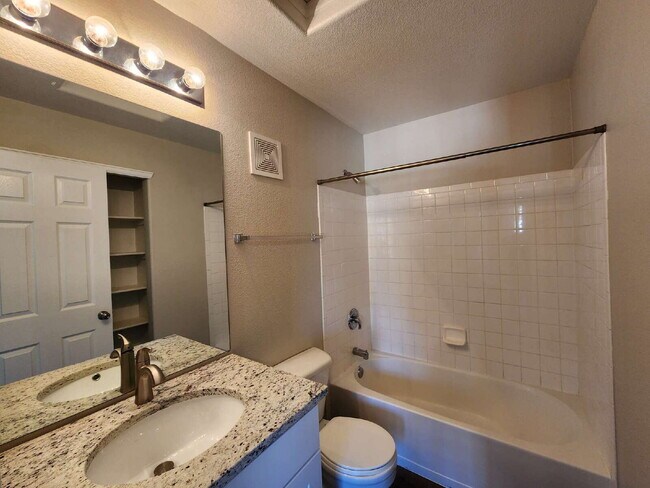 Building Photo - Spacious Two-Suite Townhome With Garage, Fireplace And Community Pool
